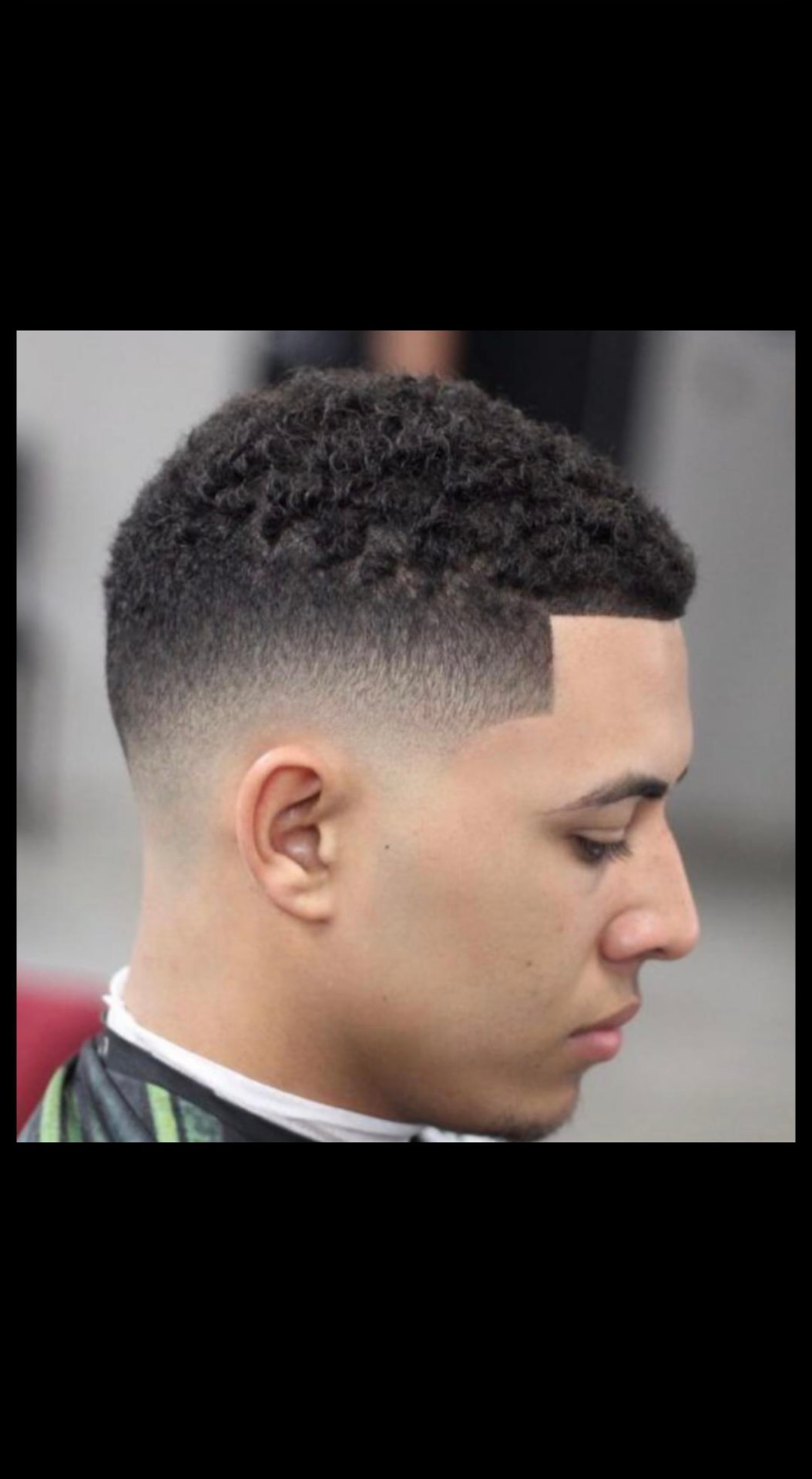 Curly Top Mid Fade with Sharp Lineup