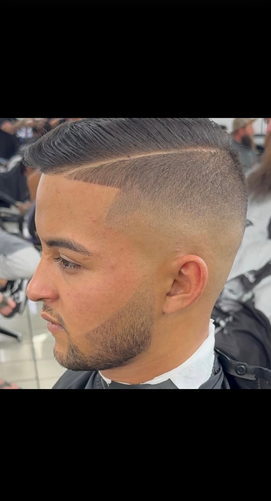 Skin Fade with Hard Part and Comb Over